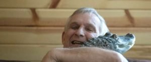 Wally, The Emotional Support Alligator on shoulders