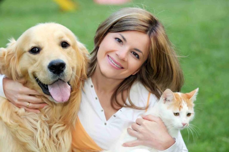 woman with cat and dog